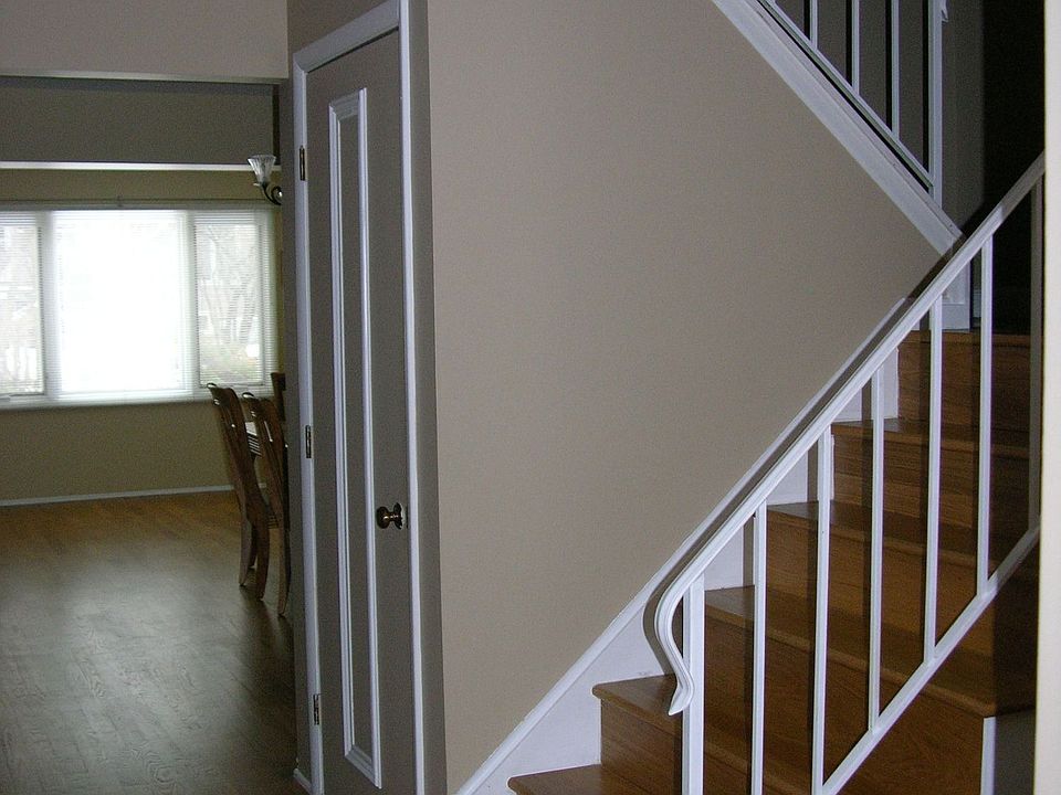 Front stairs with beautiful hardwood.