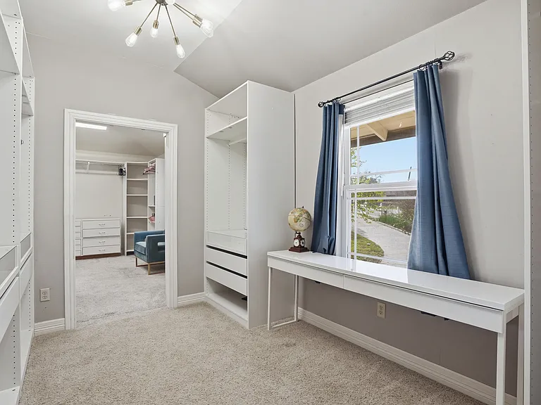 Master closet converting a bedroom to custom closet and top of the line lighting