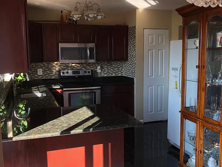 8165 Woodland Ln — Photo 2
