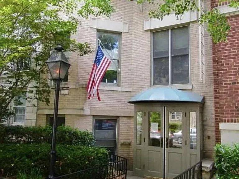Front of building with foyer entrance from R street, looking East