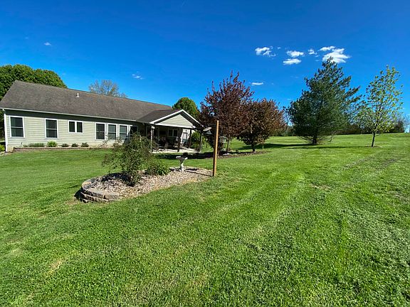 Rear of home and backyard