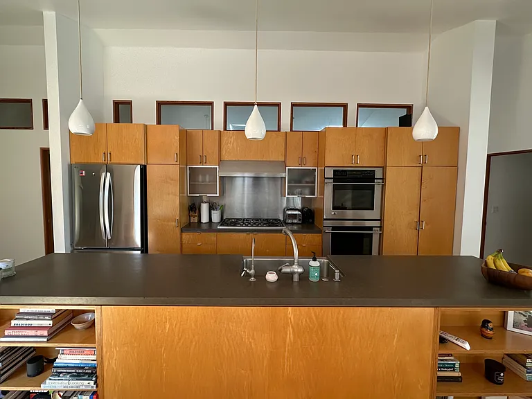 Large chef's kitchen w/14ft island, and plenty of storage. Appliances: GE Monogram 5 burner cooktop. Ventahood w/heat lamps, GE Monogram double wall ovens, Bosch D/W, LG fridge, garbage disposal, microwave, rice/slow cooker, toaster, coffee machines