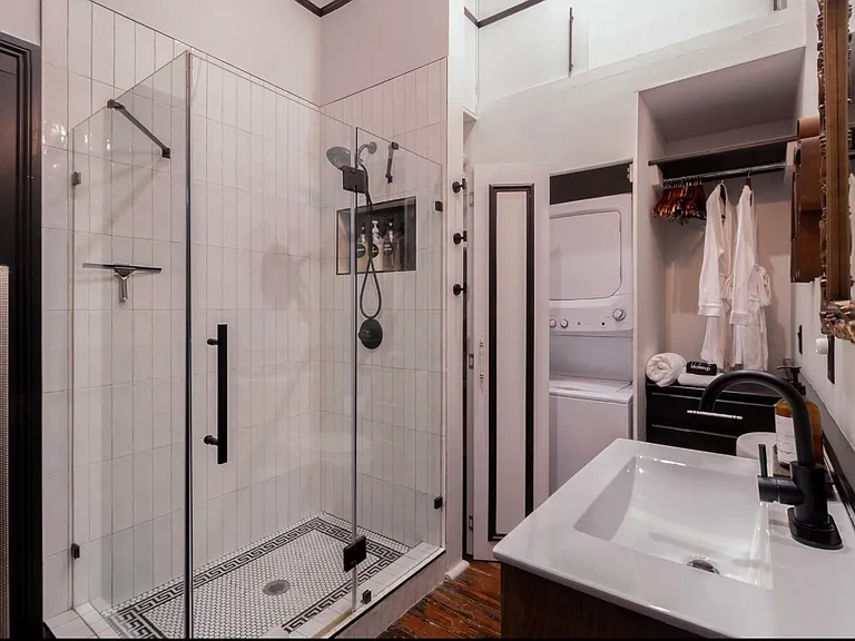 Stackable washer and dryer for added convenience, warm up in you robes and soft towels