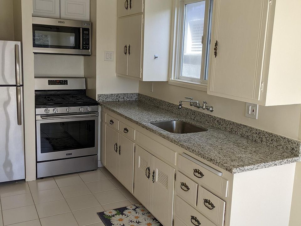 From Dining/Office Area to Kitchen.