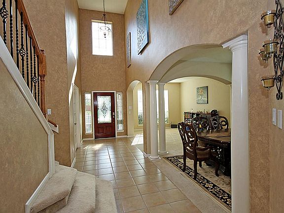 Sweeping  two story entry is magnificent.