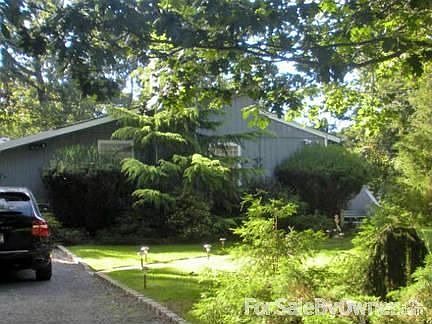 great curb appeal
						:
						lush landscaped grounds and private hedges, belgian block driveway