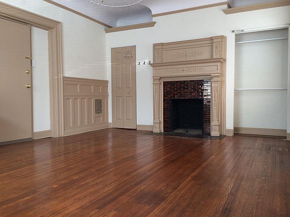 Hardwood floor and fireplace