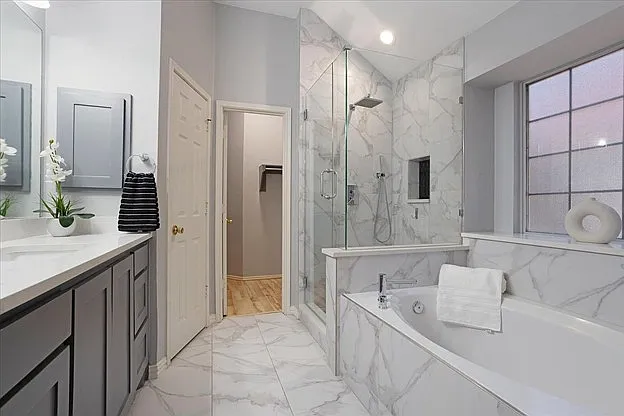 Primary bathroom
Features: Built-in Features, Closet Cabinetry, Suite Bathroom, Garden Tub/Roman Tub, Stone Counters, Separate Shower
Dimensions: 9 x 9