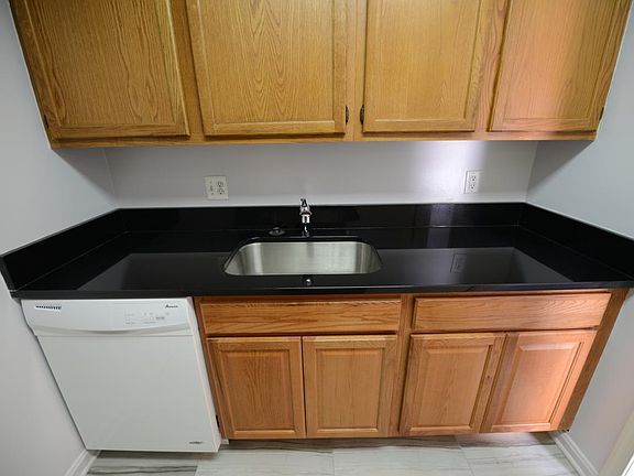 Kitchen with brand new cabinets and granite top+appliances