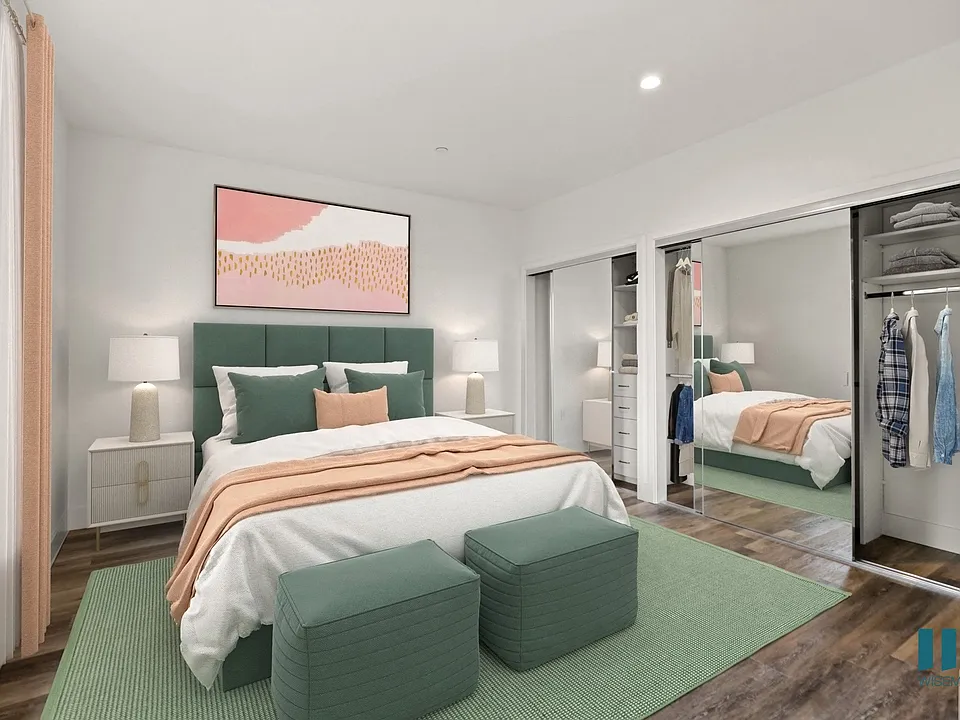 Bedroom with Two-Mirrored Closets with Built-In Organizers