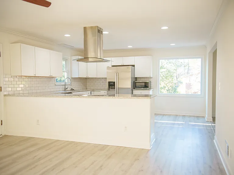 Big Windows In Kitchen, Dining Room and Living Room