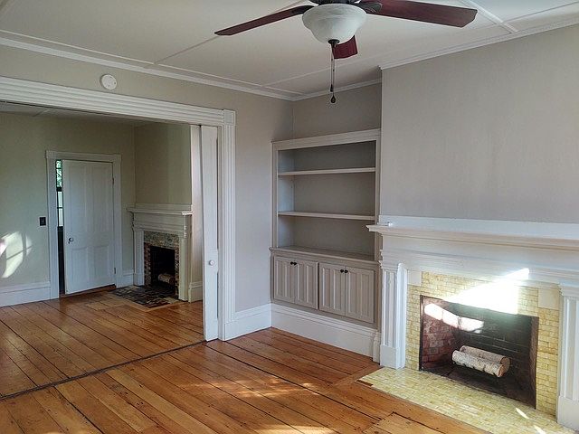 Living Room w/ entertainment center and pocket doors (for those who work at home)