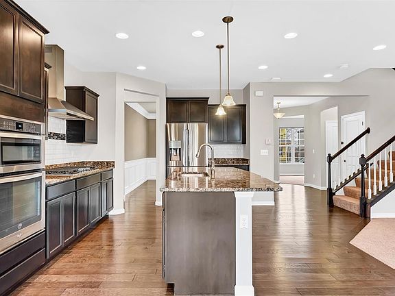 Kitchen with Large Island and Granite Countertops