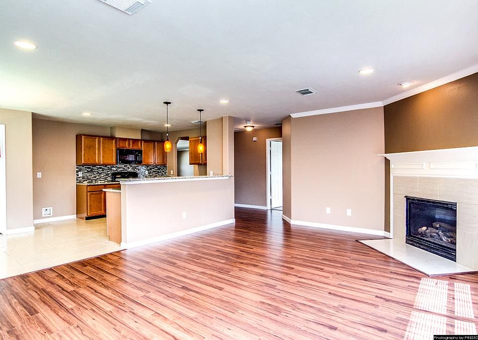 Open floor plan with all new updates icluding new tile, laminate wood flooring!