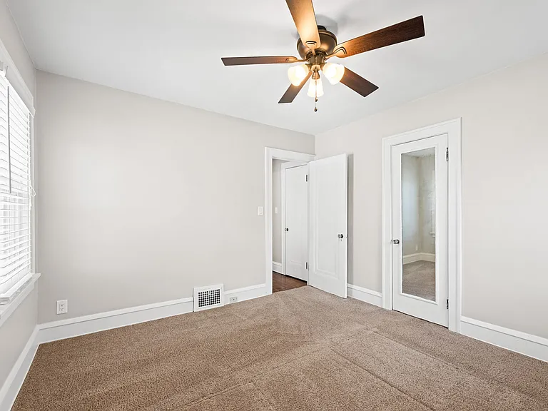 This photo shows one of the two bedrooms on the second/main floor of the unit.