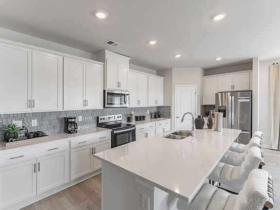 The Gibson floorplan with the Lush White interior package modeled at Madison Preserve.