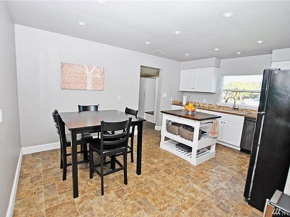 spacious eat in kitchen.  Custom island stays