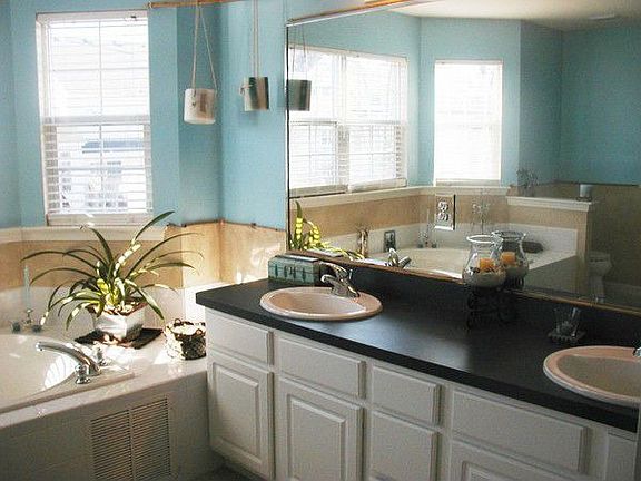 expanded master bath w/ bay window, whirlpool tub, dble sinks, seat in shower