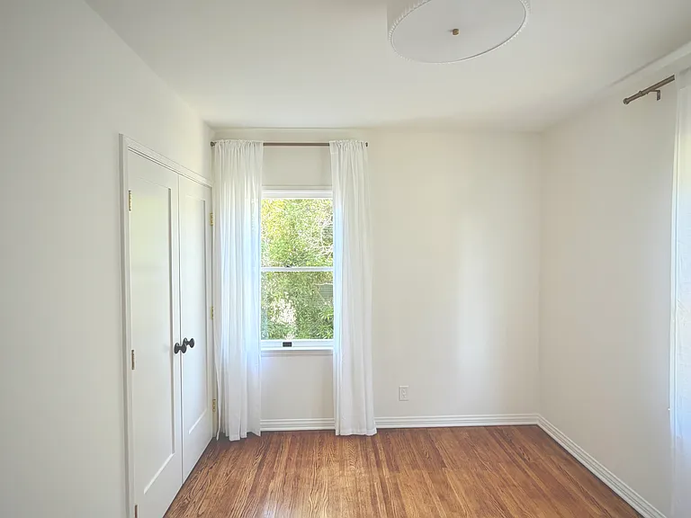 2 bedrooms. 2 windows and a closet in each bedroom. Fits a queen bed.
