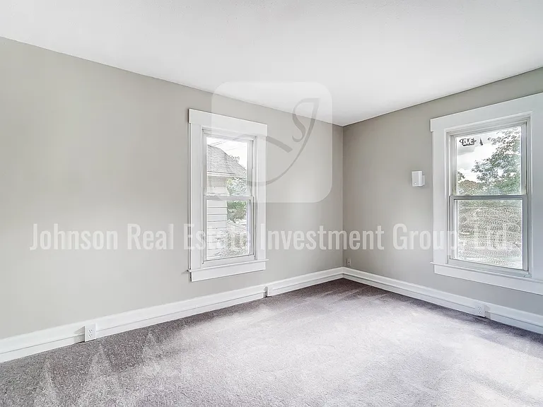 Spacious second upstairs bedroom.
