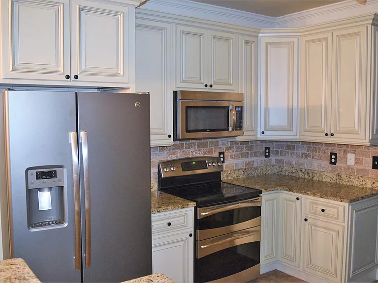 Kitchen. Refrigerator included with rental