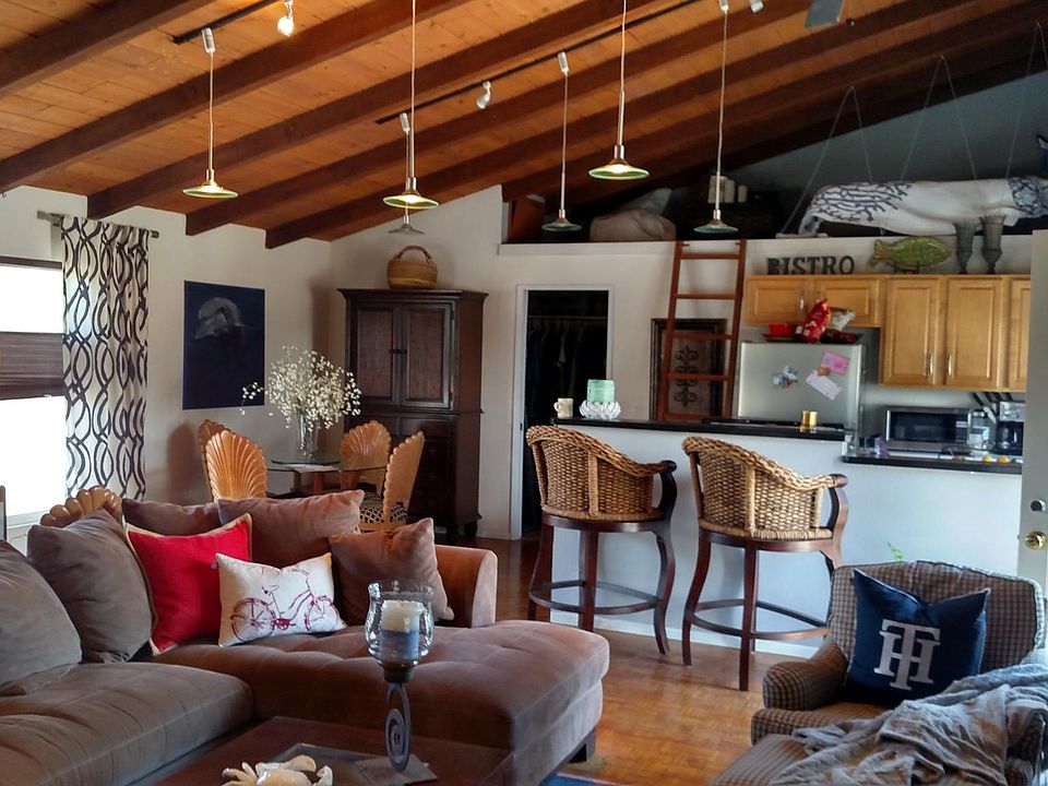 From bed area facing northwest - The ladder leads to the loft space. Bathroom (5' x 7') is directly below the loft. Walk-in closet is adjacent to the bath area through a pocket door.