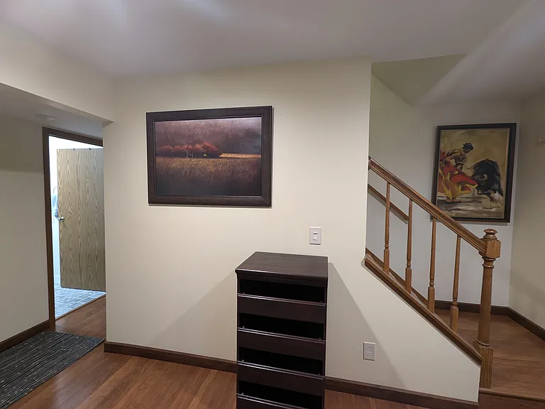 Entrance to the bathroom, basement, and second floor