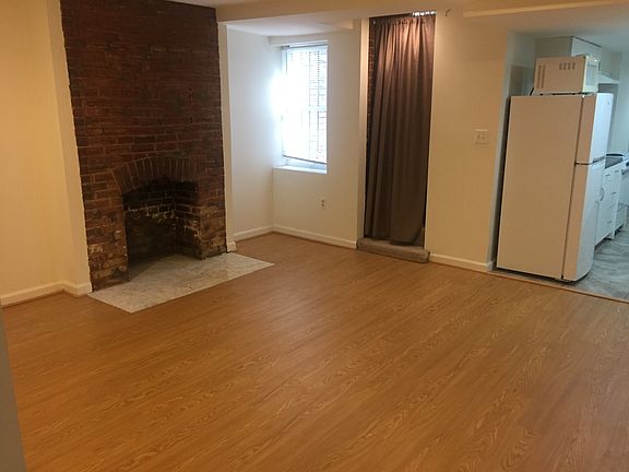 Living area with ornamental fireplace