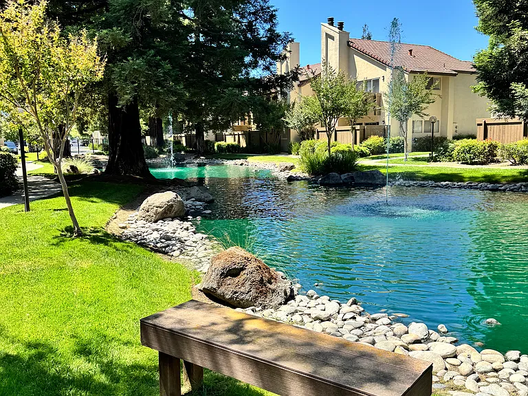 Beautiful Landscaping throughout the property. This photograph was taken from the front of Unit 117