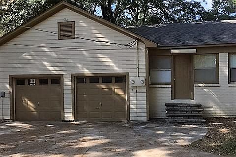 Side entrance with two car garage
