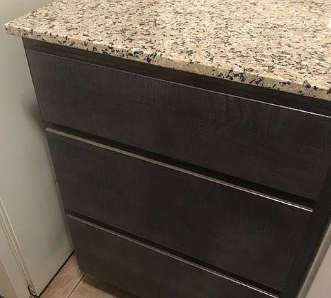 Dark gray stain with granite counters