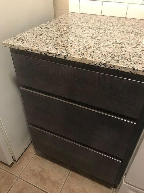 Dark gray stain with granite counters
