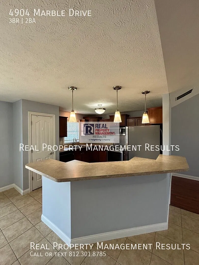 Newburgh Living with Open Layout, Garage, & Fenced Backyard — Photo 4