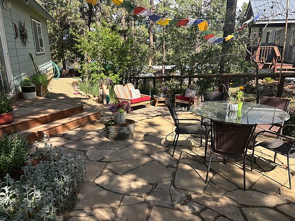 Patio looking into the fenced in yard