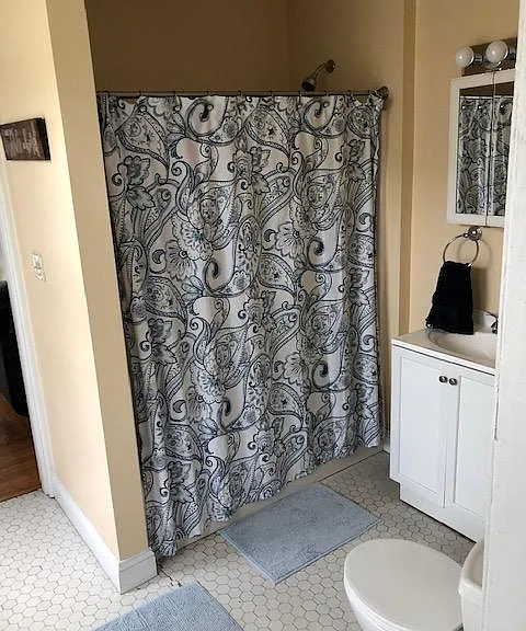 Bathroom with tub and shower