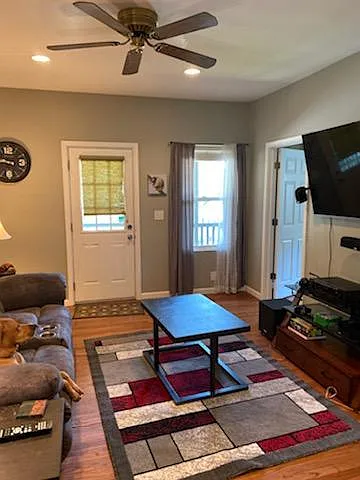 Living Room with ceiling fan.