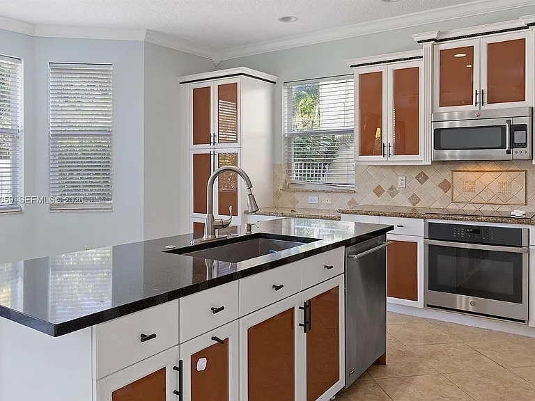 9869 Woodworth Ct — Photo 15