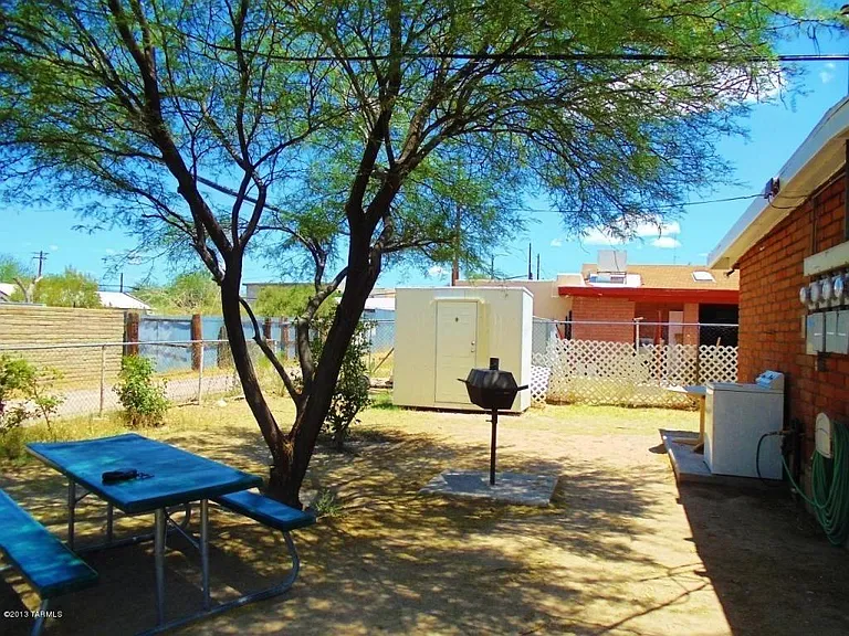 Shared side yard area with BBQ
