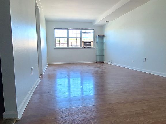 Huge, bright and sunny living cum dining area. Wood floors. Entire house freshly painted.