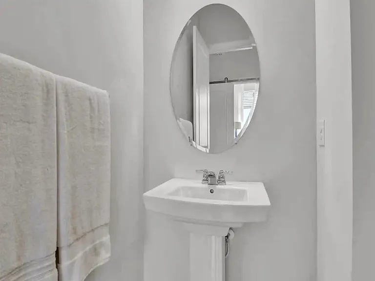 Large powder room with shower.