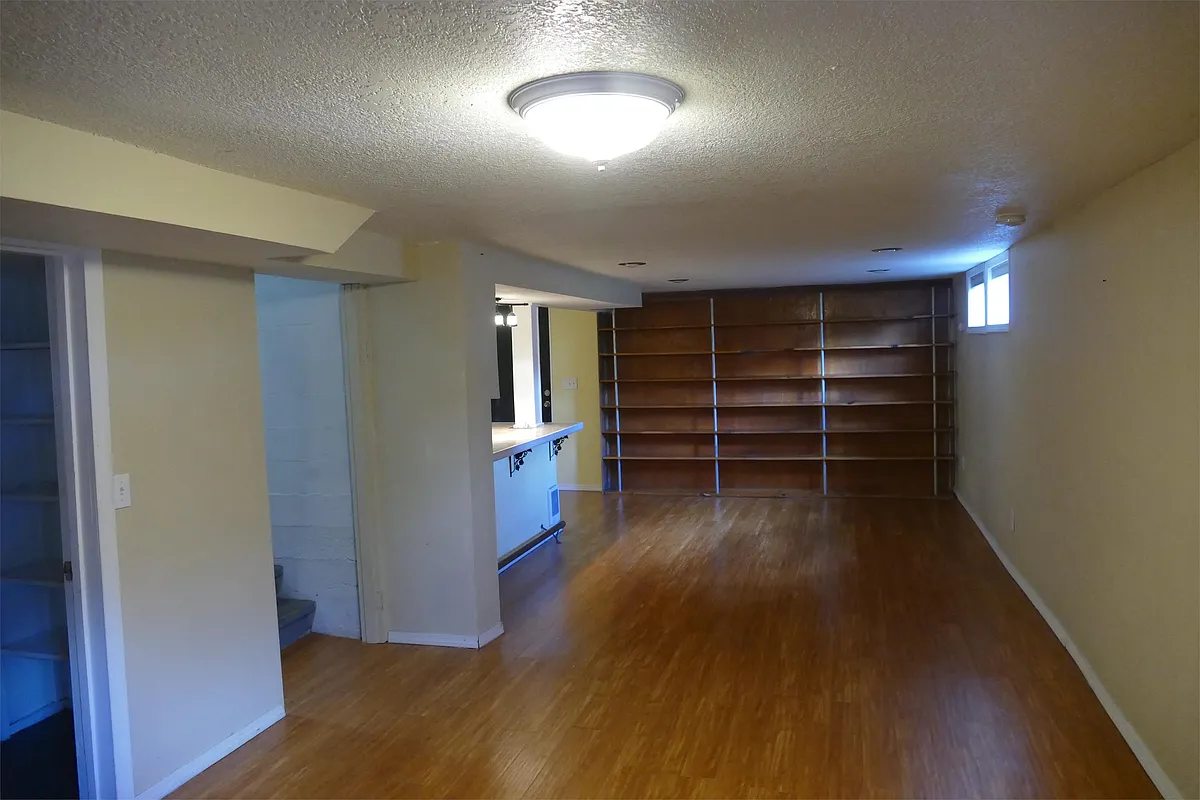 Living Room with built in shelving - 1905 SE 89th Ave #B