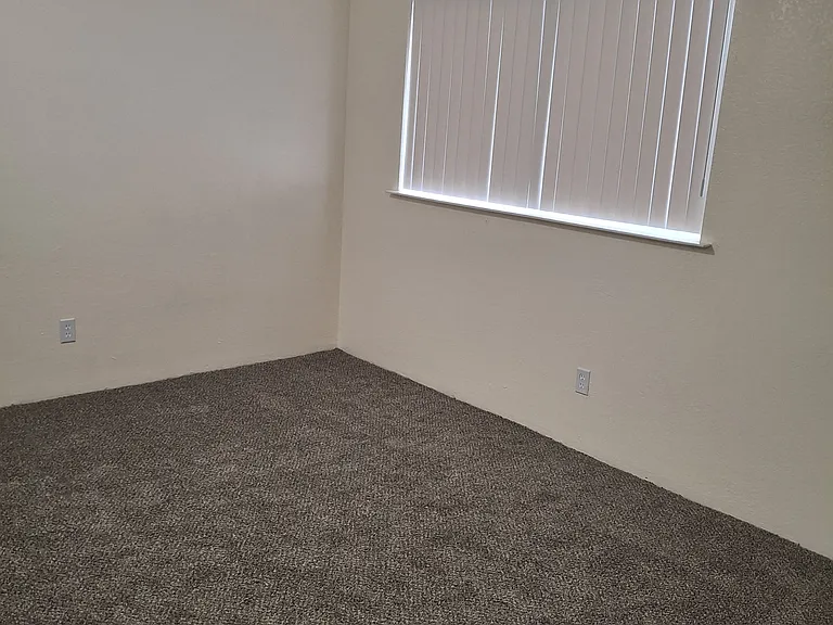 Bedrooms are larger than they appear in the photo