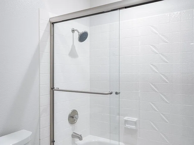 Full bathroom downstairs adjoining guest bedroom