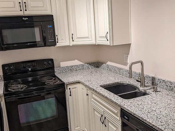 Sink and Range Wall with LED ceiling lights