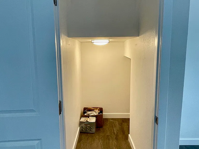 Under stairway storage space / rear unit