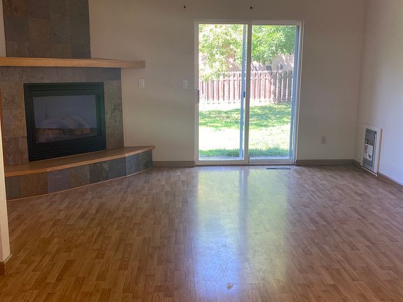 Living Room with fireplace and dog door