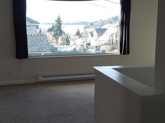 View from hall to full bath and master bedroom