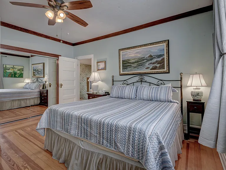 Master bedroom with king sized bed, with memory foam mattress topper.
