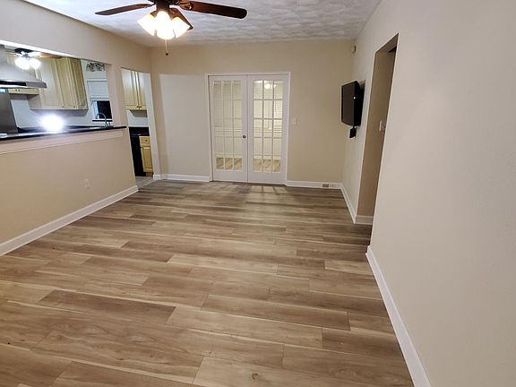 French pocket doors give privacy to sunroom