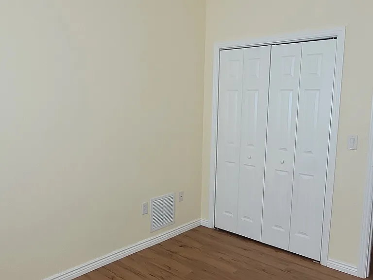 2nd Bedroom with folding doors closed